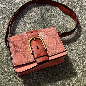 Pink snakeskin Fossil purse